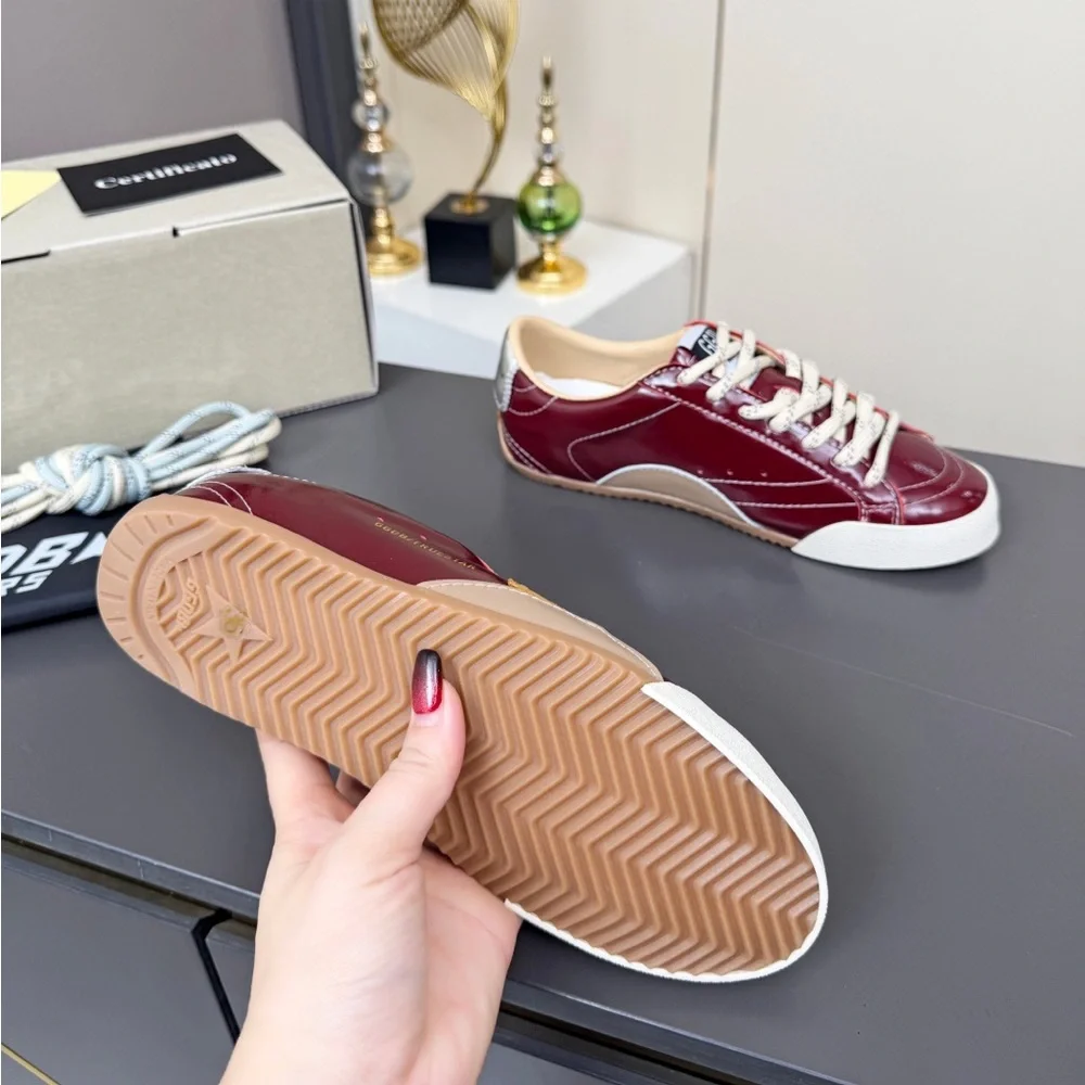 Golden Goose Women's Burgundy Leather Low-Top Sneakers with White Soles